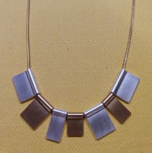 Sleek Geometric Silver and Gold Charmed Necklace
